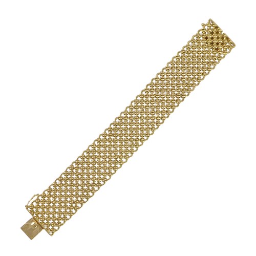 Gold meshlink 'Resille' broad strap bracelet, Cartier, Paris,
